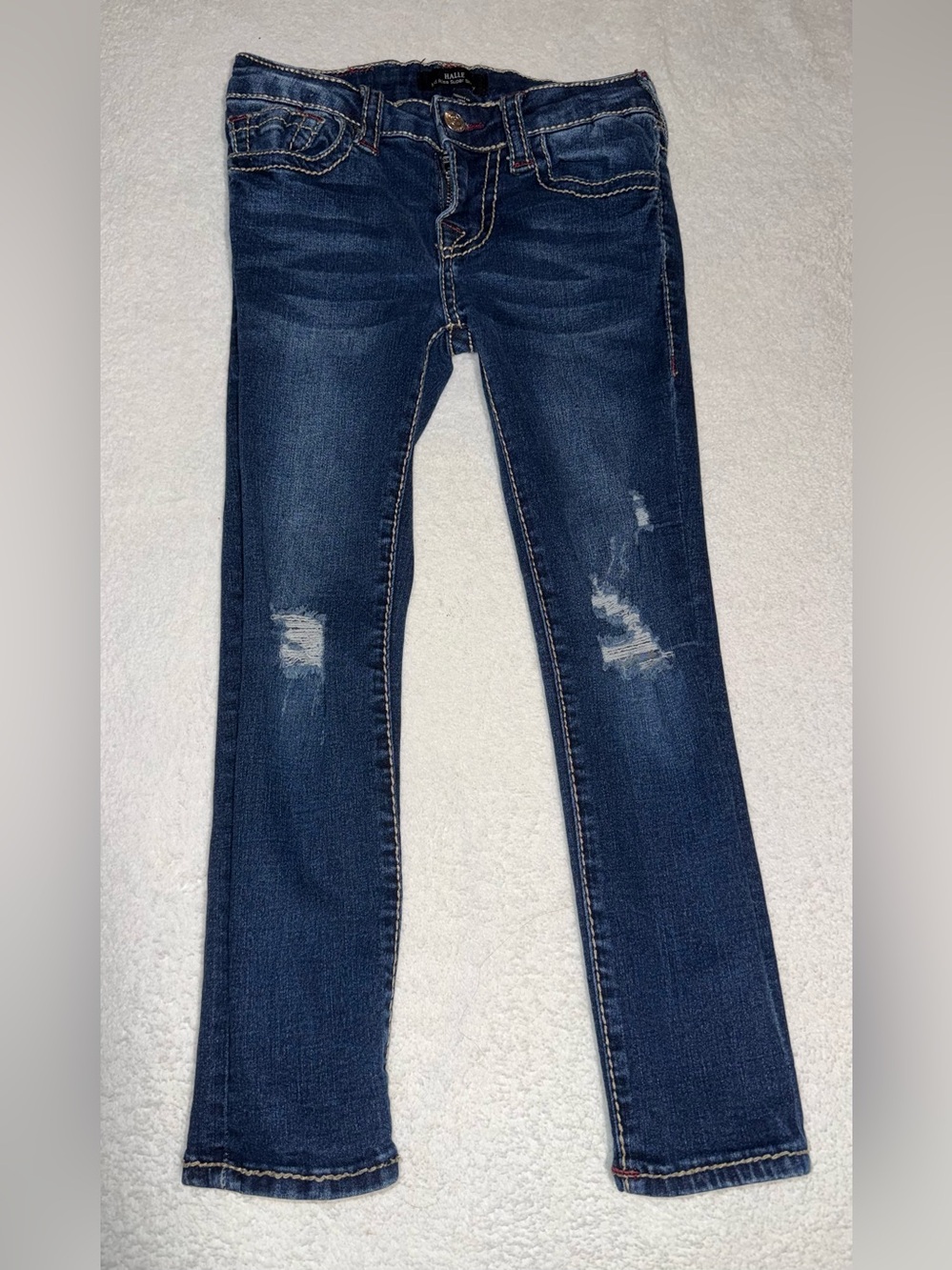 True Religion Halle skinny jeans w/a dark wash finish and distressed knees, sz 6